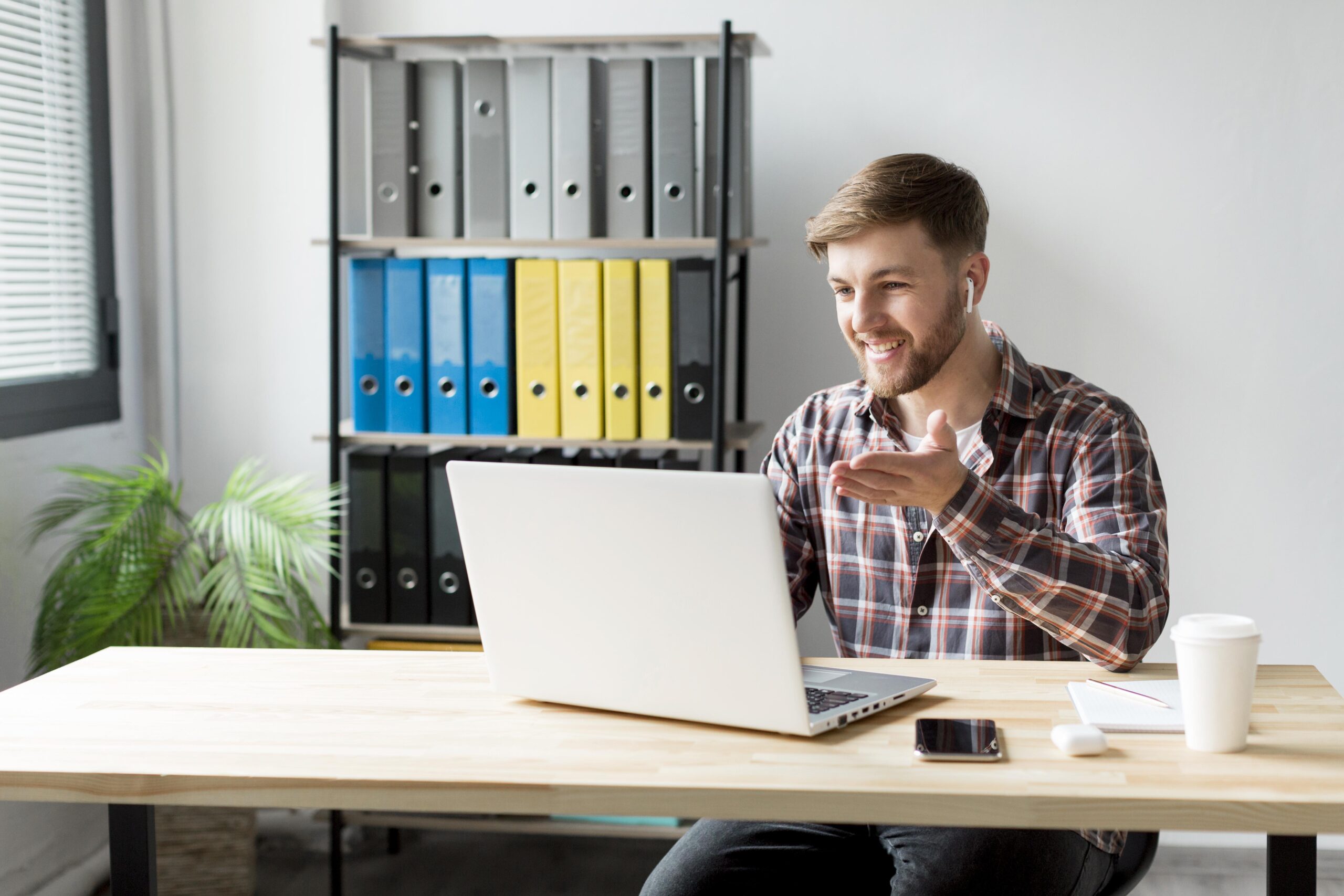 smiley-man-working-laptop
